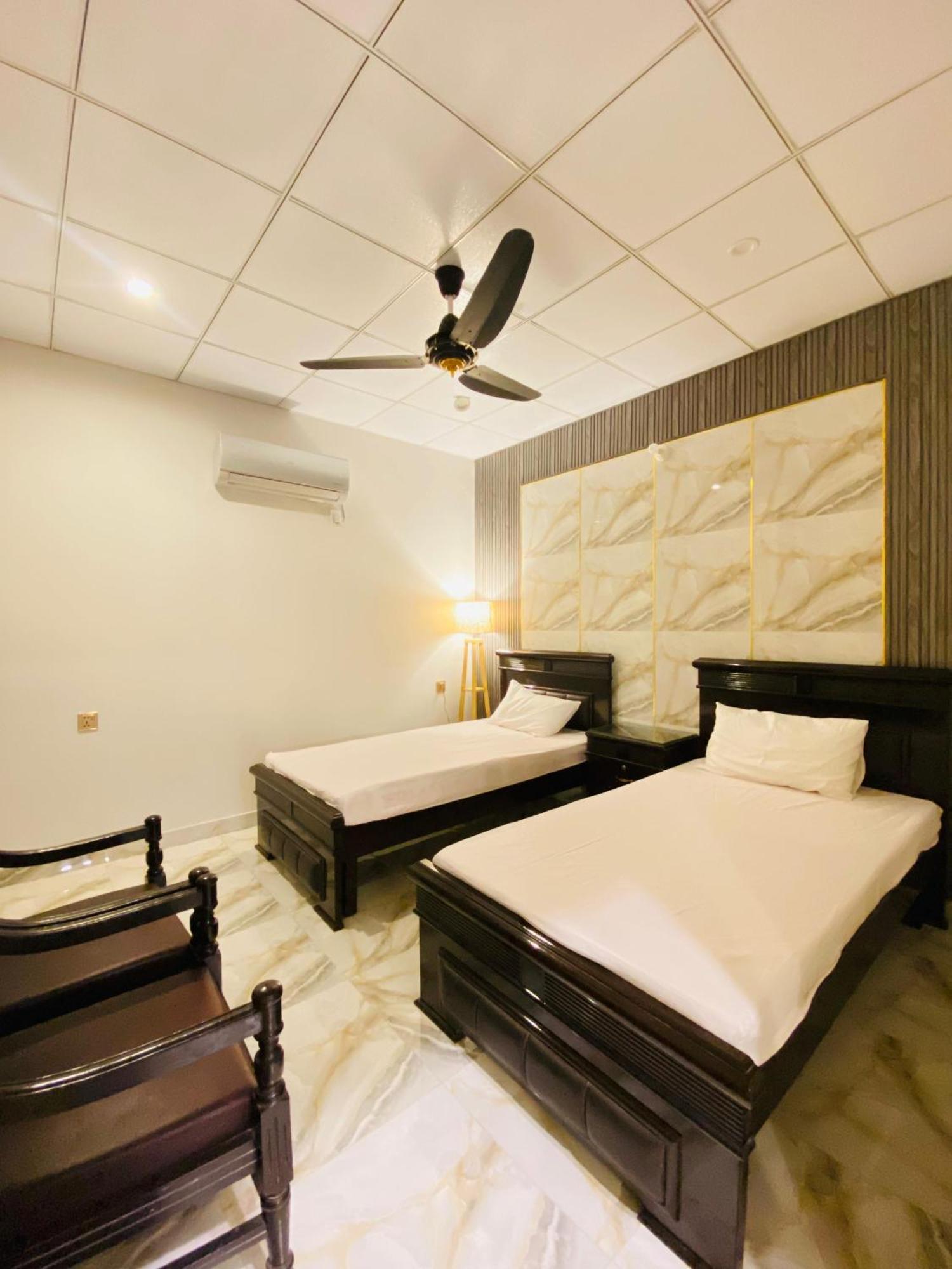Comfy Cottage Faisalabad Exterior foto